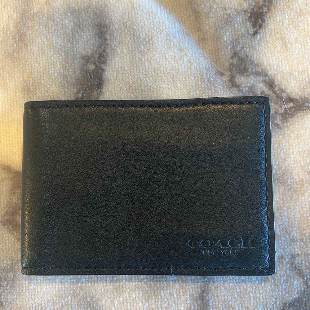 Coach men’s card wallet.